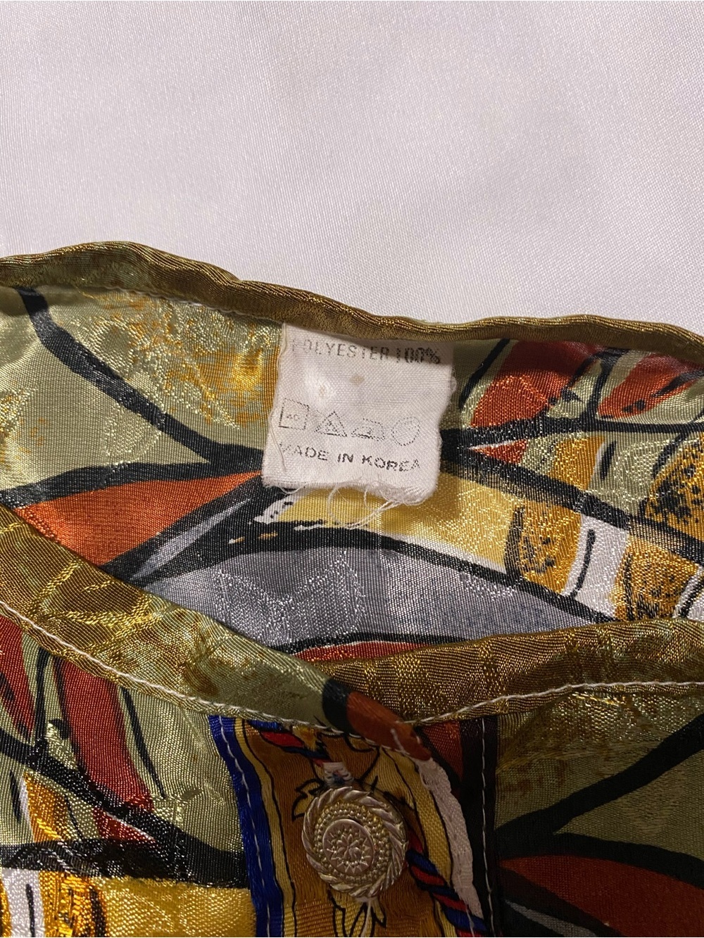 Artistic Abstract Face Print Bomber Jacket in Olive, Gold, Black - Picture 6 of 9